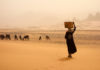Woman in Sandstorm In Sudan